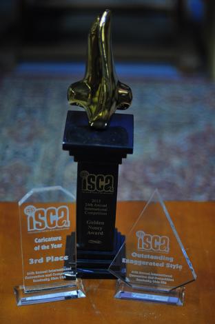 Grigor Eftimov's awards from the International Society of Caricature Artists